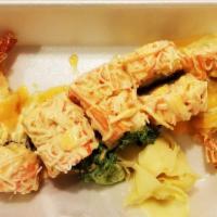 Tokyo Roll · Spicy shrimp tempura with avocado and crabmeat. 
