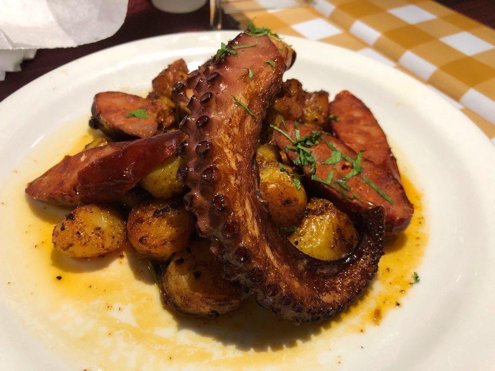 Grilled Octopus and Chorizo · Served with paprika butter roasted fingerling potatoes.