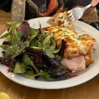 Le Croque Monsieur · French grilled cheese with ham and bechamel. Served with salad. Croque madame with egg on top.