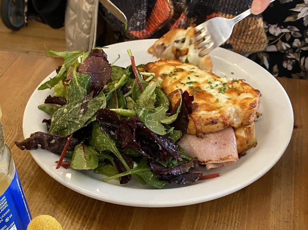 Le Croque Monsieur · French grilled cheese with ham and bechamel. Served with salad. Croque madame with egg on top.