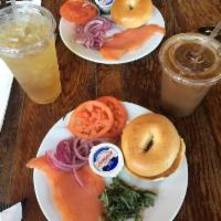 Smoked Salmon Plate · with cream cheese, sliced onion, tomato, basil and your choice of bagel