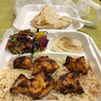 Chicken Shish Kabob Plate · 6 pieces of marinated charbroiled chicken breast Kabob comes with hummus, salad, rice and ga...