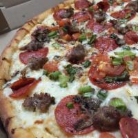 Garlic Supreme Pizza · White creamy sauce, chopped tomatoes, Italian sausage, pepperoni, mushrooms, green onion, an...