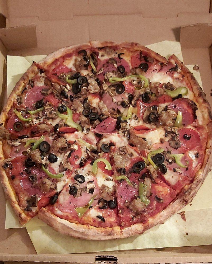 Combination Pizza · Red sauce, salami, pepperoni, ham, bell peppers, olives, mushrooms, and sausage.