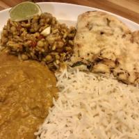 Shahi Korma · Rich and zesty sauce with cashews, tomato, onion, and tamarind. Served with choice of protei...