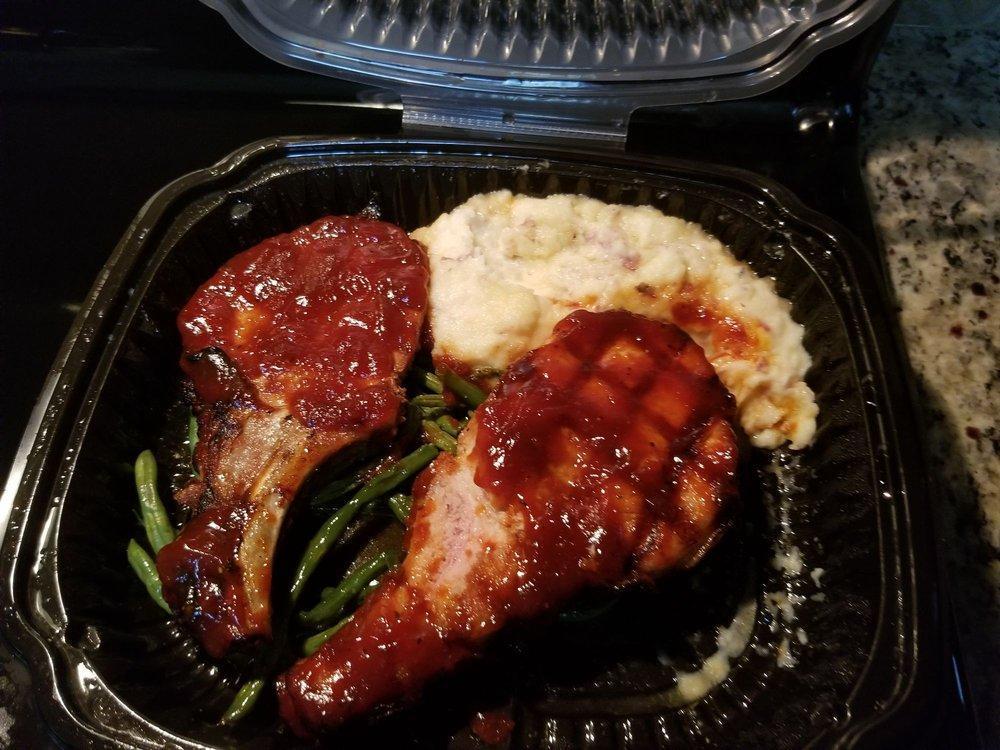 Drunken Pork Chops · Brined center-cut pork chops topped with whiskey barbecue glaze and served with garlic Parmesan mash and green beans.