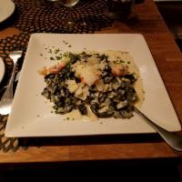 Fettuccine Nero · Homemade organic pasta with leeks, shallots, garlic, shrimp, local wild scallops and cream s...