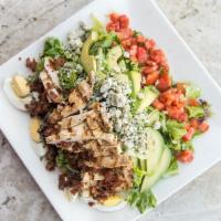 Cobb Salad · Flame broiled chicken breast, bacon, avocado, tomato, romaine, field greens, Gorgonzola, har...
