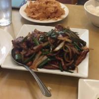 Mongolian Beef · Splendid in it's simplicity, sweet and aromatic green onions are stir-fried with tender slic...