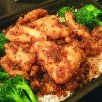 Shelby's Sweet and Spicy Chicken · Just like the girl it's named after, this dish begins sweet... then the subtle heat of the b...