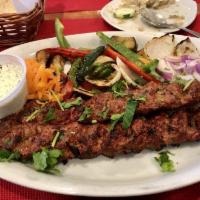 Beyti Kebab · Chopped lamb flavored with fresh peppers and spiced with paprika, garlic, onions and grilled...
