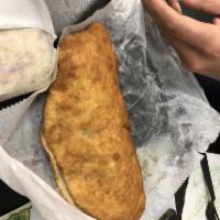 Aloo Pie · A soft, fried dough made from flour and water, and filled with boiled, spiced and mashed pot...