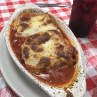 Lasagna · Ground beef and a mix of Italian cheeses, in marinara sauce, and baked with mozzarella and p...