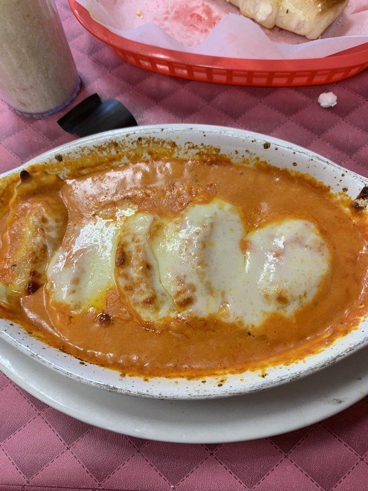 Lobster Ravioli · Ravioli stuffed with lobster cooked with creamy pink sauce and baked with mozzarella and provolone cheese. Comes with garlic rolls.
