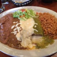 Mexican Flag Cheese Enchiladas · Gravy sauce, sour cream sauce, and green sauce. Stuffed tortilla topped with chili sauce.
