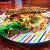 Pimento Cheese Sandwich Lunch · Homemade pimento cheese with lettuce and tomato. Served on choice of whole wheat molasses or...
