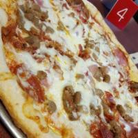 Meat Lover Pizza · Pepperoni, ham, sausage, ground beef, bacon.