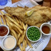 Fish and Chips · Our bestseller and “The best fish and chips in town” Traditional beer-battered cod, with chi...