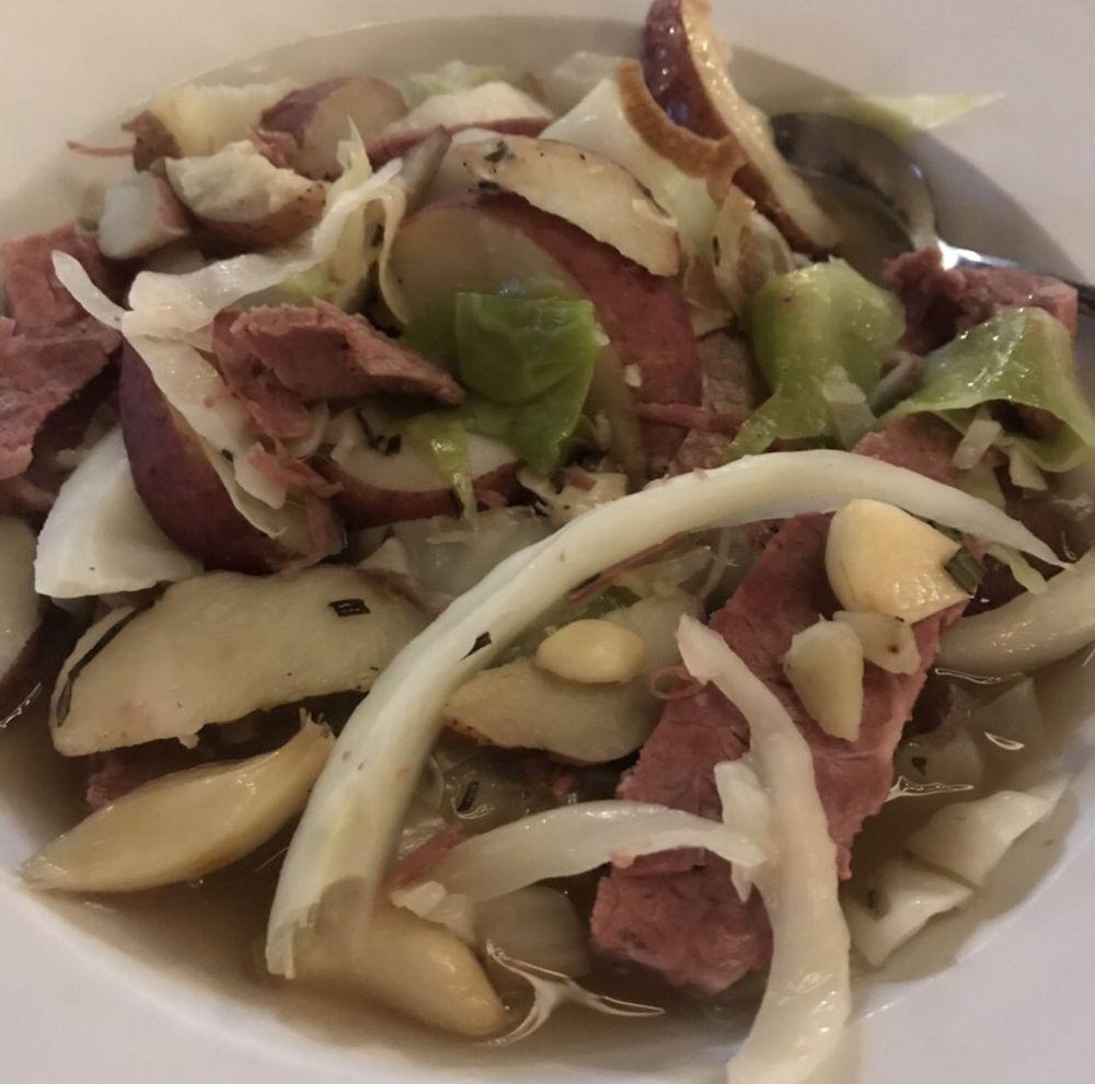 Corned Beef and Cabbage · 6oz of the highest-quality corned beef, slow cooked in Guinness and spices, with roasted rosemary potatoes and braised cabbage