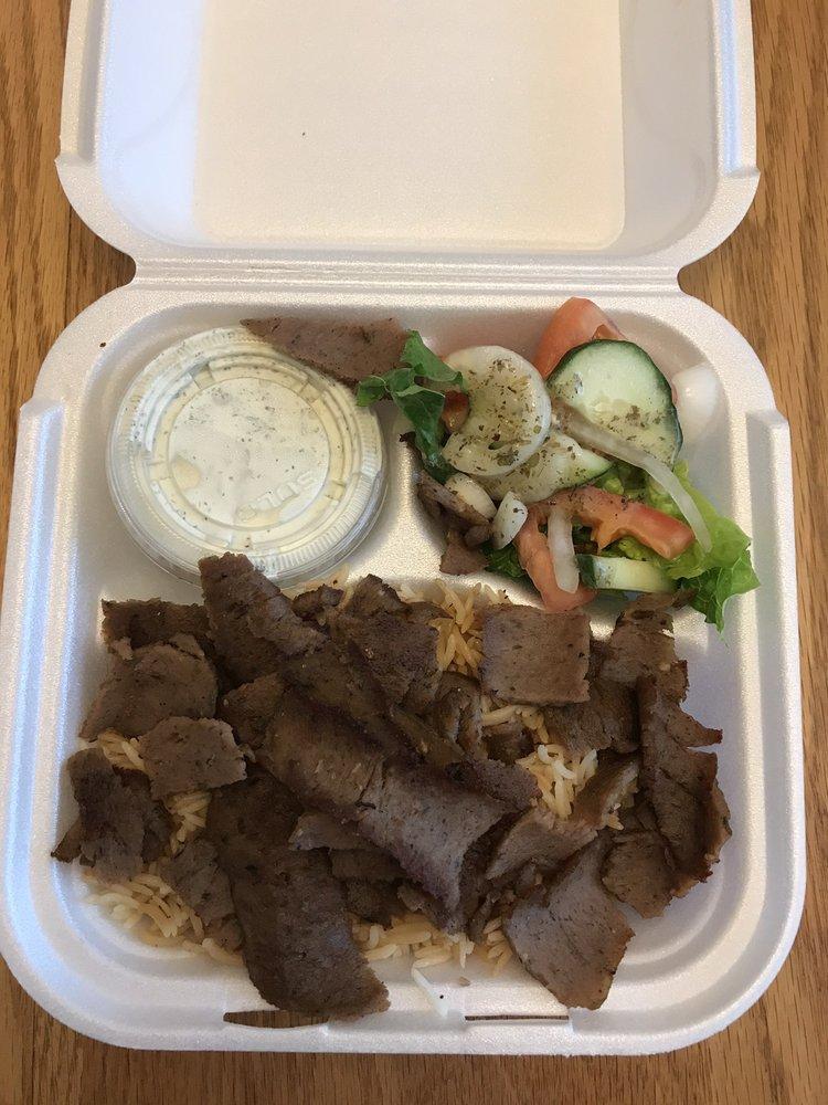 Beef Gyro Plate · Served with beet and lamb gyro, rice, hummus, pita bread and Greek salad.