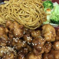 Orange Chicken Plate · Lightly battered deep-fried chicken simmered in own special sauce.