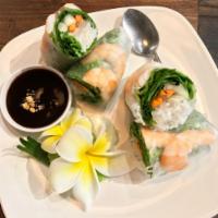 Fresh Spring Rolls · Rice paper wrapped with mixed green, carrot, cucumber and basil with homemade peanut sauce. 
