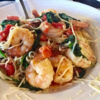Jumbo Shrimp Scampi · Succulent jumbo shrimp tossed with angel hair pasta in a classic white wine and garlic sauce...