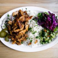 Chicken Shawarma Plate · Basmati rice plate with meat, toppings and sauce. Served with pita (or tell us to skip it to...