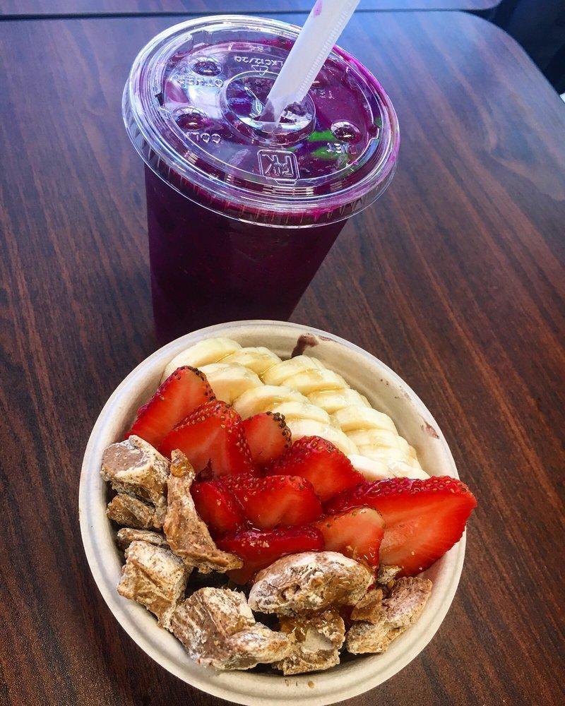 Classic Bowl · Organic Acai blended with coconut milk and banana topped with fresh strawberry, sliced banana, gluten free granola, and local honey.