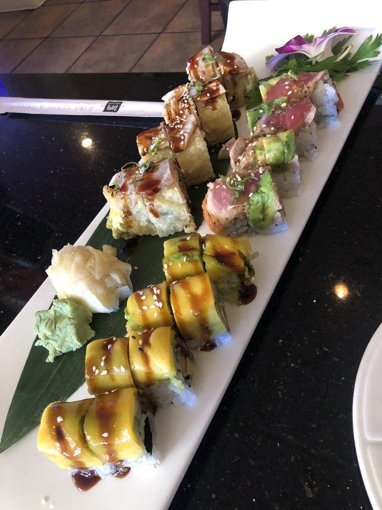 Red Dragon Roll · Spicy tuna and crunch inside with seared tuna and avocado outside.