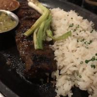 Carne Asada · Grilled skirt steak, green onion, jalapeno, corn tortilla.