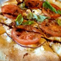 Caprese Pizza · Olive oil base, garlic, five cheeses, red onion, sliced tomatoes, balsamic vinegar, olive oi...