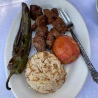 Shish Kebab · Marinated USDA choice filet mignon charbroiled to perfection. Served with our delectable ver...