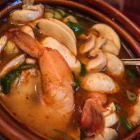 Tom Yum Soup · Hot and sour soup. A little spicy. 