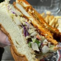 Fried Chicken Sandwich ·  Marinated fried chicken breast, coleslaw, chipotle, pickles on Hawaiian bun and a side of g...