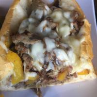 Roast Beef Supreme Sub · Sauteed bell peppers and onions with mayo, baked with mozzarella.