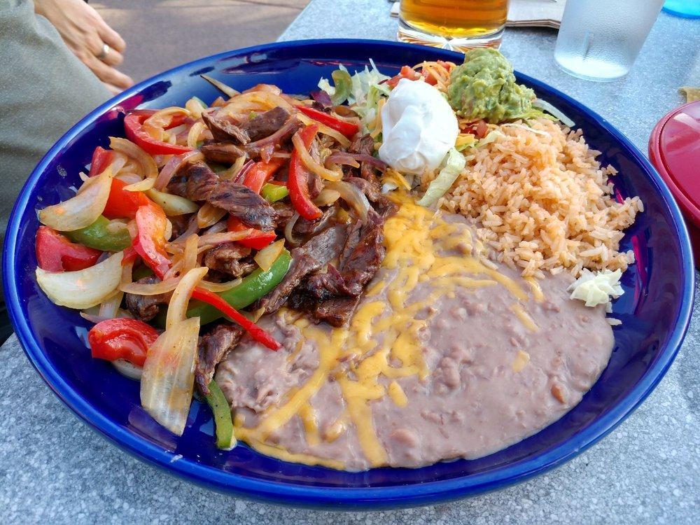 Carne Asada · Skirt steak charbroiled the Mazatlan way. Served with guacamole, pico de gallo, rice and beans.