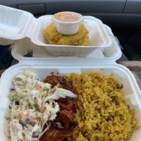 Chicken and Rice Plate · Saucy barbecue soy chicken served with arroz con gandules and coleslaw. 