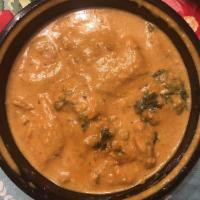 Chicken Korma · Chicken cubes cooked in a rich almond sauce.