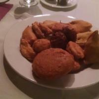 Assorted Appetizers · Veg and non-veg. Assortment of samosas, aloo tikki, veg pokoras and cheese or chicken pakora...