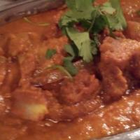 Chicken Kadai · Boneless chicken cooked with onions, peppers and hot chilies that is spicy, but not overpowe...