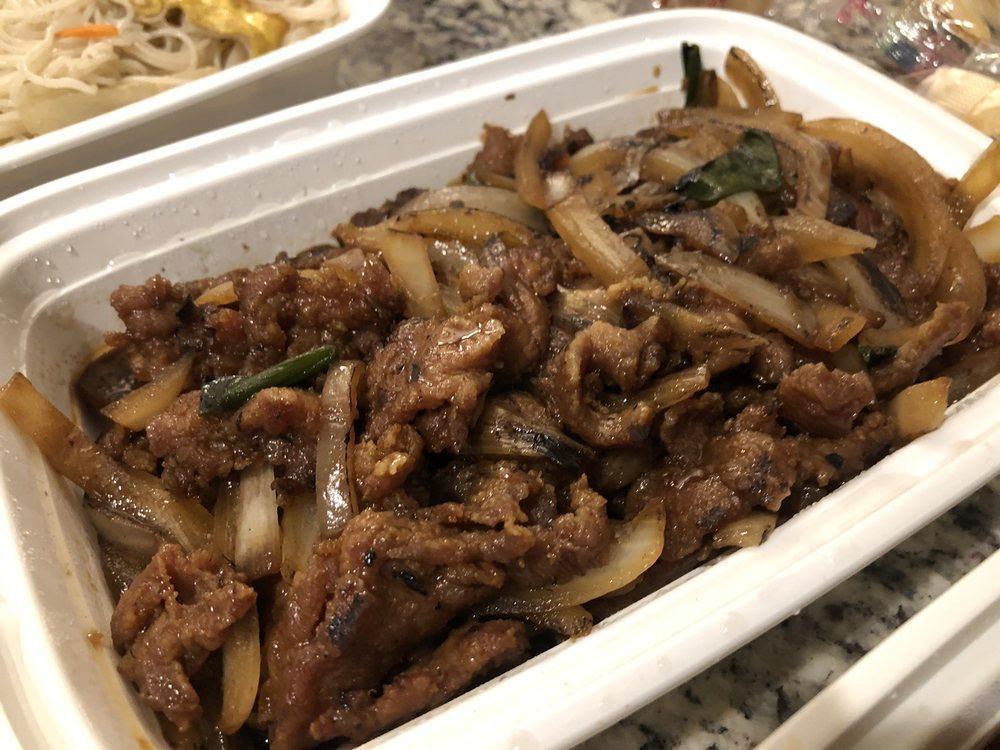 Mongolian Beef · Sliced flank steak stir-fried with onions and green onion served over crispy cellophane noodles.