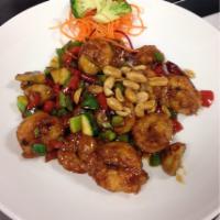 Kung Pao Shrimp · Jumbo shrimp stir-fried in chili kung pao spice with bell peppers, peanuts and red chili pep...
