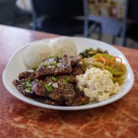 Kalbi · Grilled Korean short ribs. All plate lunches come with 2 scoops of rice and mac salad, cucum...