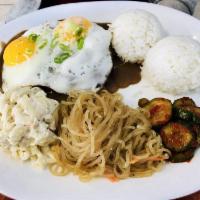 Loco Moco · Hamburger patty topped with gravy and 2 fried eggs. All plate lunches come with 2 scoops of ...