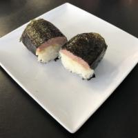 Spam Musubi · Grilled spam on rice wrapped with nori.
