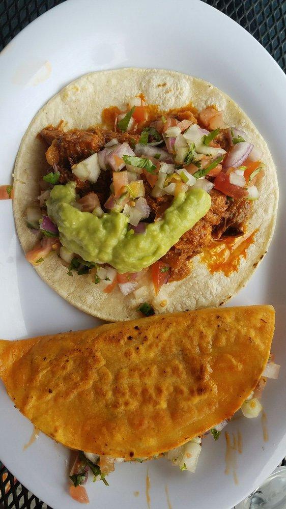 Al Pastor Taco · Pork, onion and pineapple marinated on a red sauce, and pico de gallo.