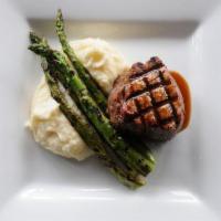 Filet Mignon · Served with red wine demi-glace, whipped potatoes and grilled asparagus.