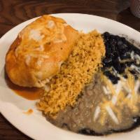 Chimichanga · Fried flour tortilla stuffed with your choice of filling. Topped with cheese and ranchero sa...