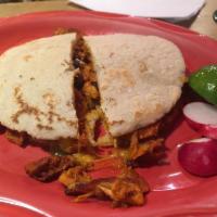 Quesadillas · Fresh flour tortillas grilled and filled with cheddar jack cheese and your choice of filling...